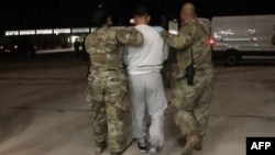 Lawsuit by US rights group seeks access to migrants sent to Guantanamo Bay