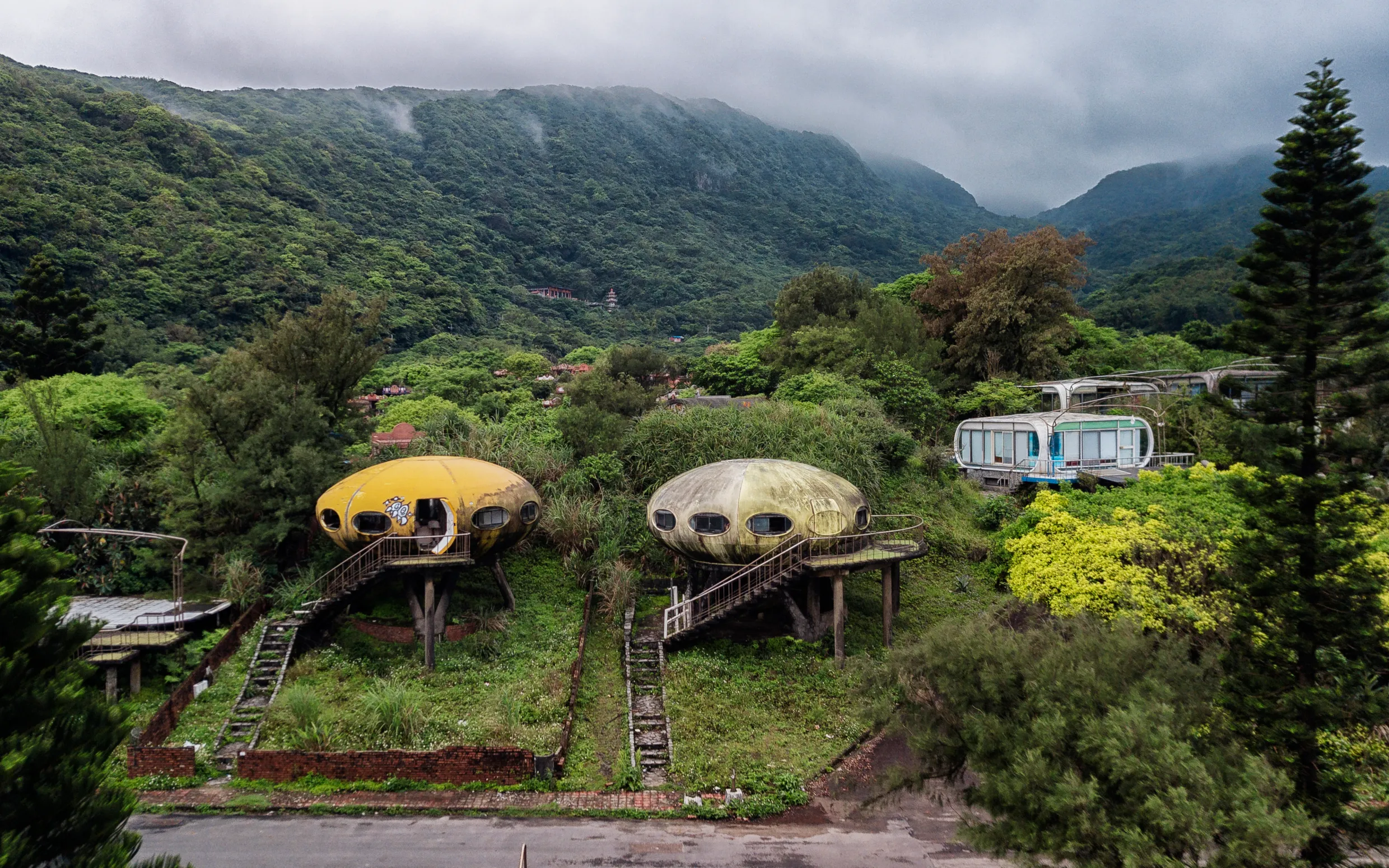 Inside world-famous abandoned ‘UFO village’ packed with rotting spaceship hol homes designed as ‘fu...