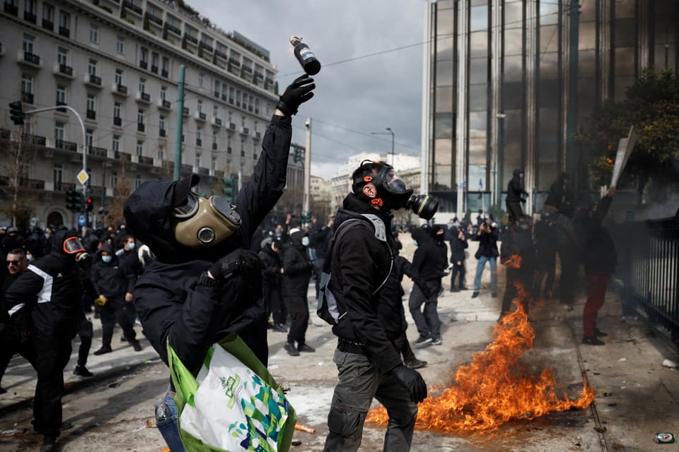 Police fire tear gas at protesters in Athens in clashes on rail disaster anniversary