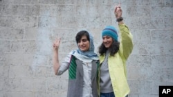 Iran pardons journalists who covered woman’s death that triggered protests