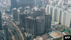 Well-off Hong Kong daunted by record deficits