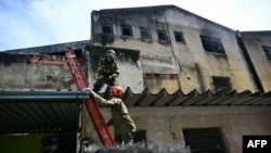 Fire at Rio de Janeiro Carnival costume factory injures 21