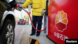 China's fuel demand may have passed its peak, IEA says