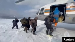 Russia says it rescued all 139 fishermen stranded on ice floe in Western Pacific sea