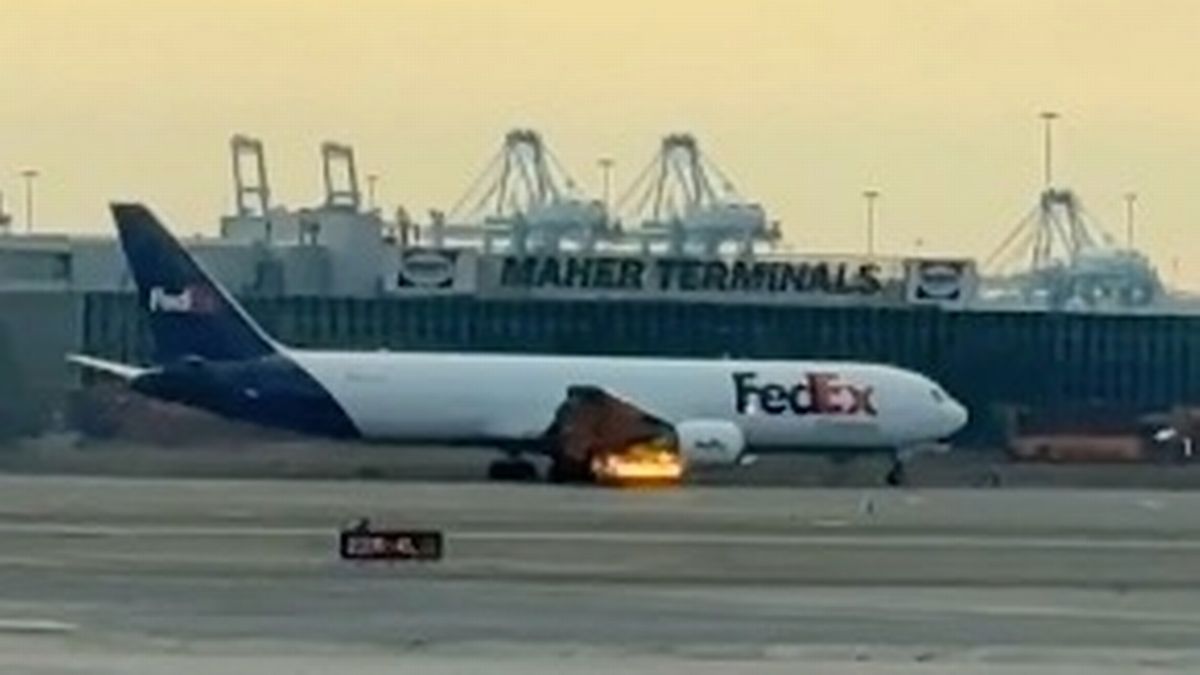 Terrifying moment flames roar from FedEx plane engine taking off at airport