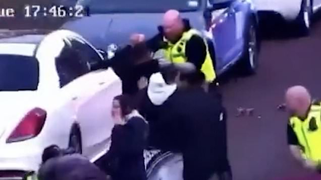 Huge fight breaks out between thugs and police with six people arrested