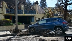 US braces for flooding; parts of California face mudslides 