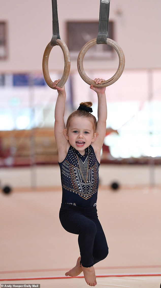 Olympic medallist Max Whitlock's daughter, two, joins him in the gym