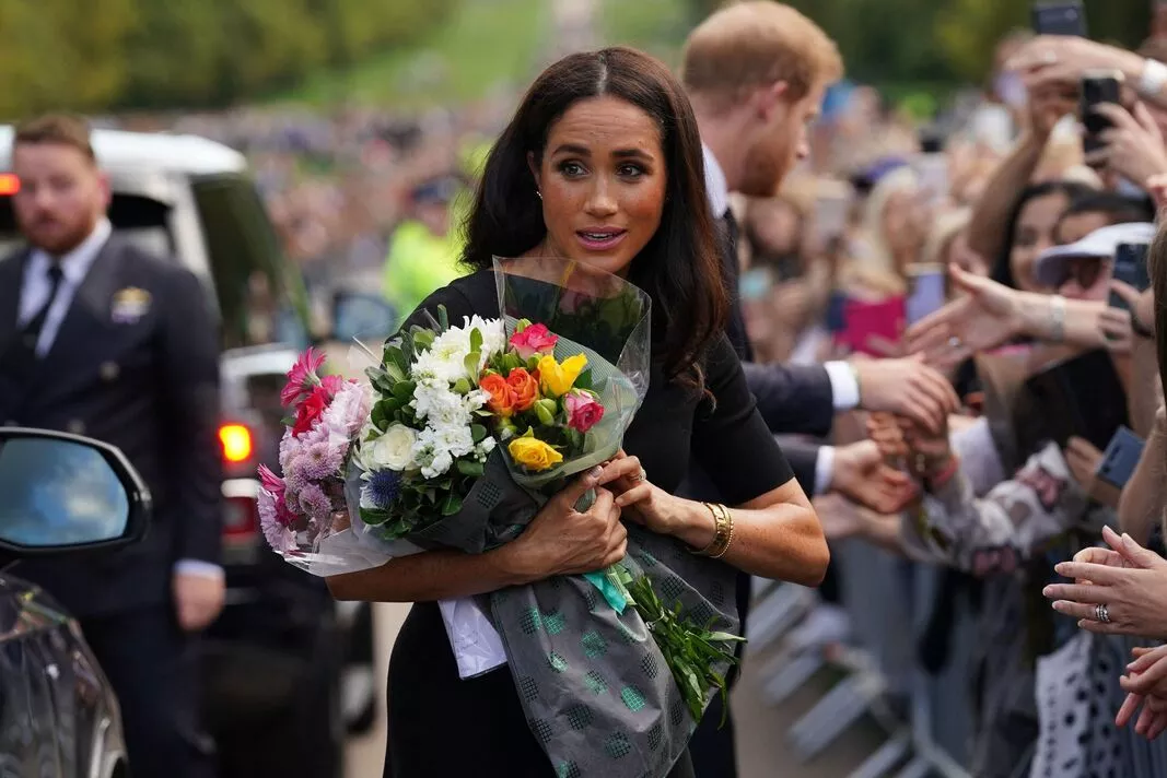 What Meghan really said to aide in viral moment after Queen's death
