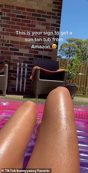 Sunbather shows off her $46 inflatable tanning bed