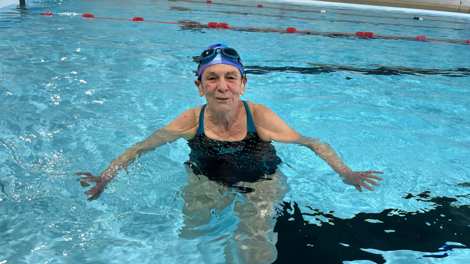 Woman repeats feat of being first to swim at March pool