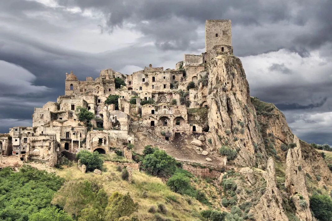 Abandoned Italian 'ghost town' carved into a rock that's haven for dark tourism