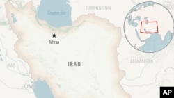 Iranian authorities raid homes of Baha'i minority, arrest 2