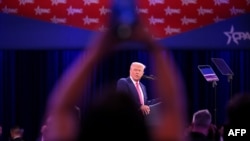 Trump praises government downsizing efforts before CPAC crowd 