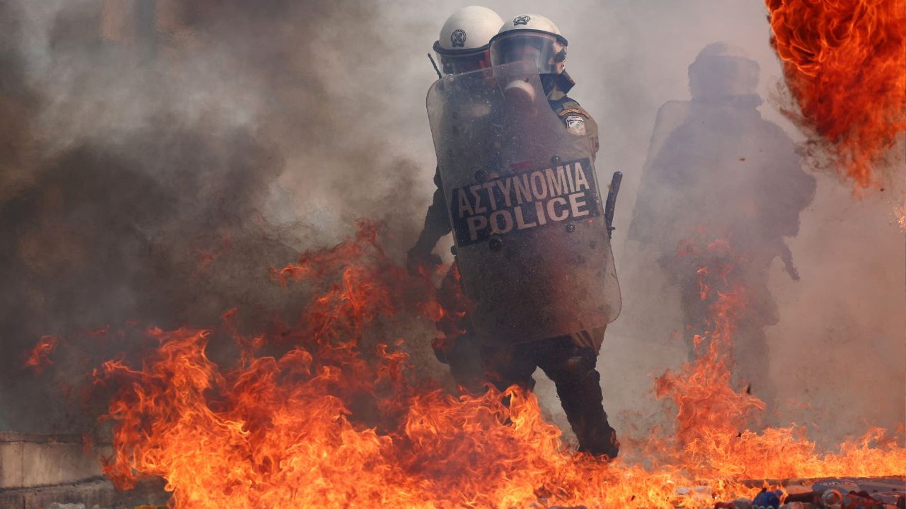 Violent protests erupt in Greece on anniversary of deadly train crash