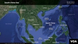 China opposes Vietnam's building work on disputed reef in South China Sea 