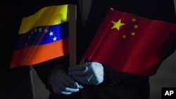 How does China quiet its influence in Latin America?