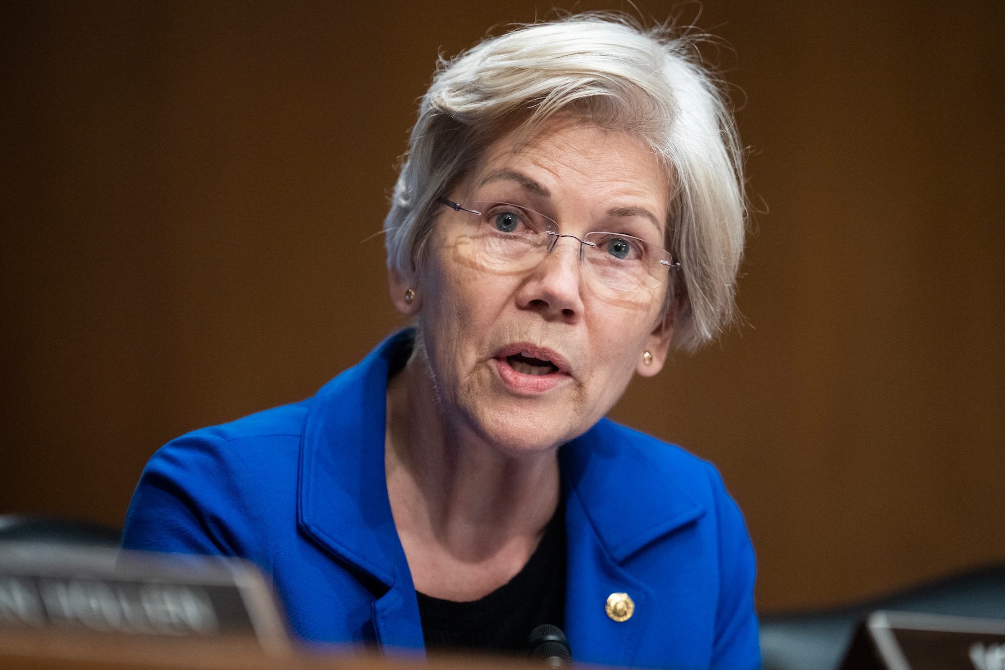 It's time for the Fed to cut interest rates and bring relief to Americans who 'cannot afford to pay rent,' Elizabeth Warren says